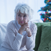 lonely grieving woman during the holidays